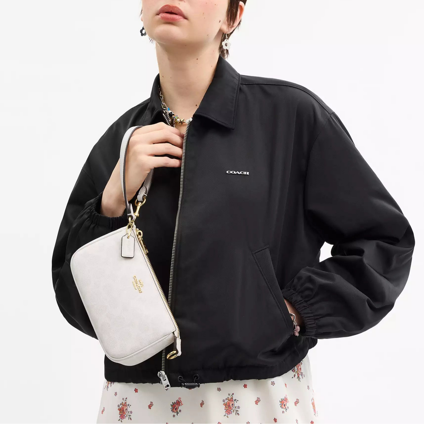 Nolita 19 en lona de firma Coach