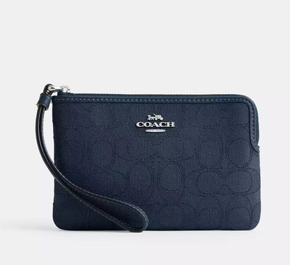 Bolso de mano con cremallera en las esquinas Coach