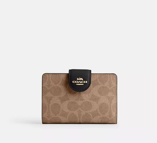 Cartera mediana con cremallera en las esquinas Coach