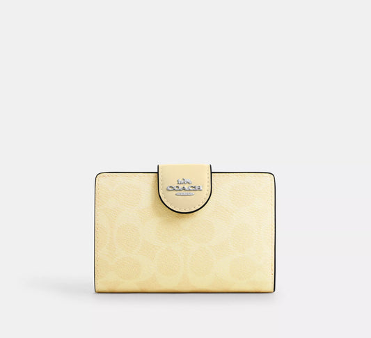 Cartera mediana con cremallera en las esquinas Coach