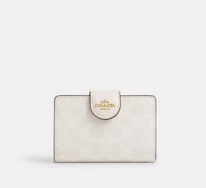 Cartera mediana con cremallera en las esquinas Coach